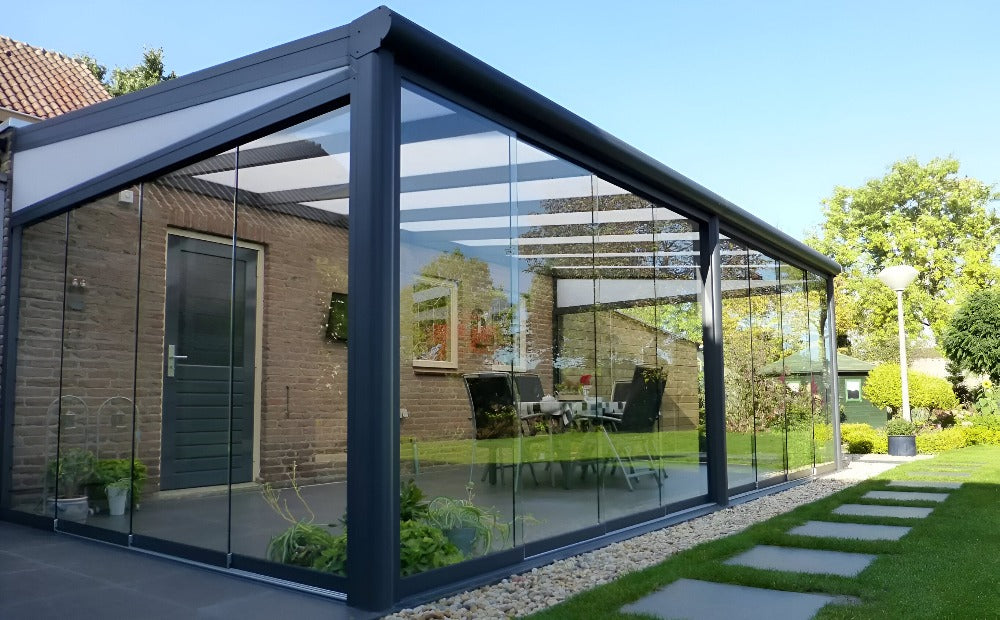 Deponti Bosco Aluminium Pergola Veranda Grey with Glass Door - Side View attached to the House